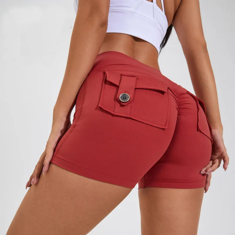 Women's high-waist quick-dry fitness shorts with side pockets in avocado green colour