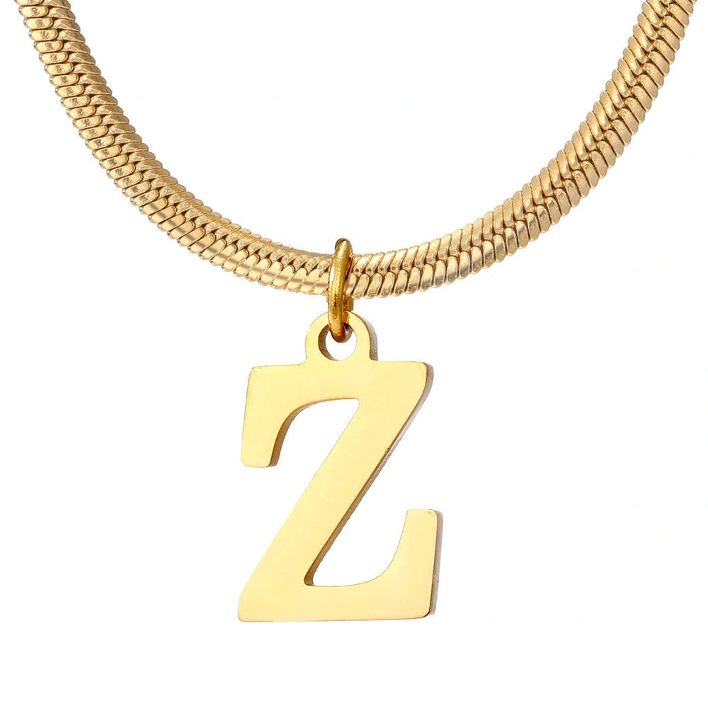 Elegant gold A-Z letter pendant necklace on a snake chain