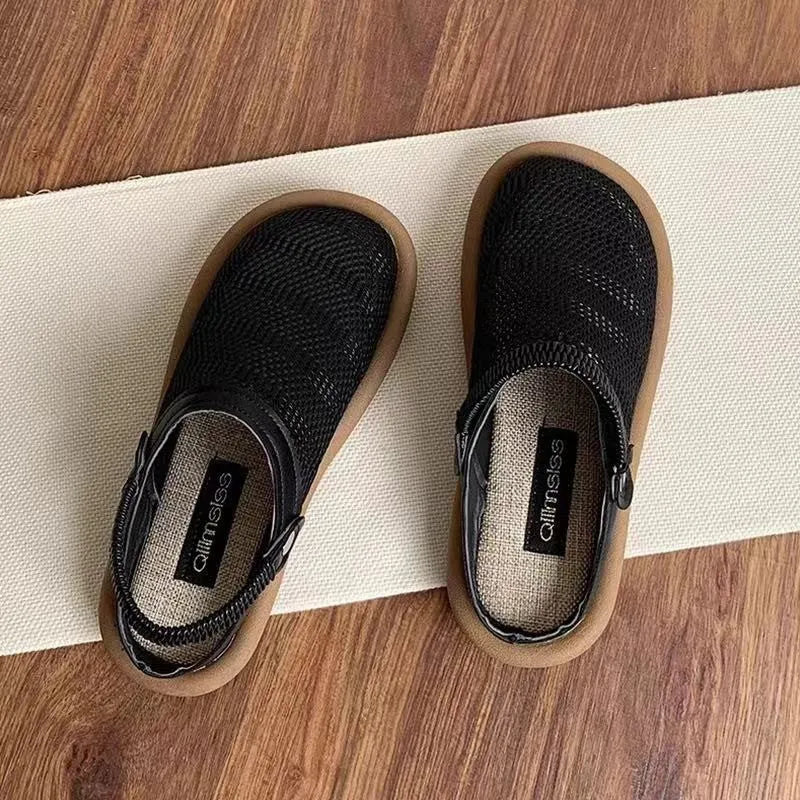 Breathable linen slip-on hole shoes in milky white colour with mesh lining and rubber sole.