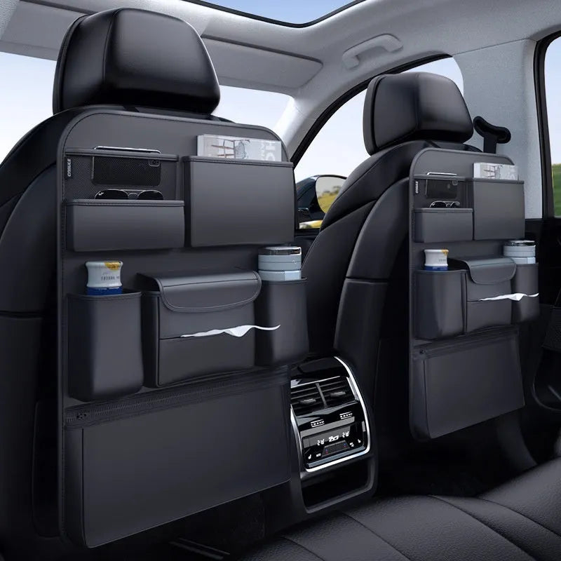 Car seat back storage hanging bag in durable leather material with carrying handle for organisation, available in black large and black small sizes for hanging on vehicle seat backs to hold personal items during travel