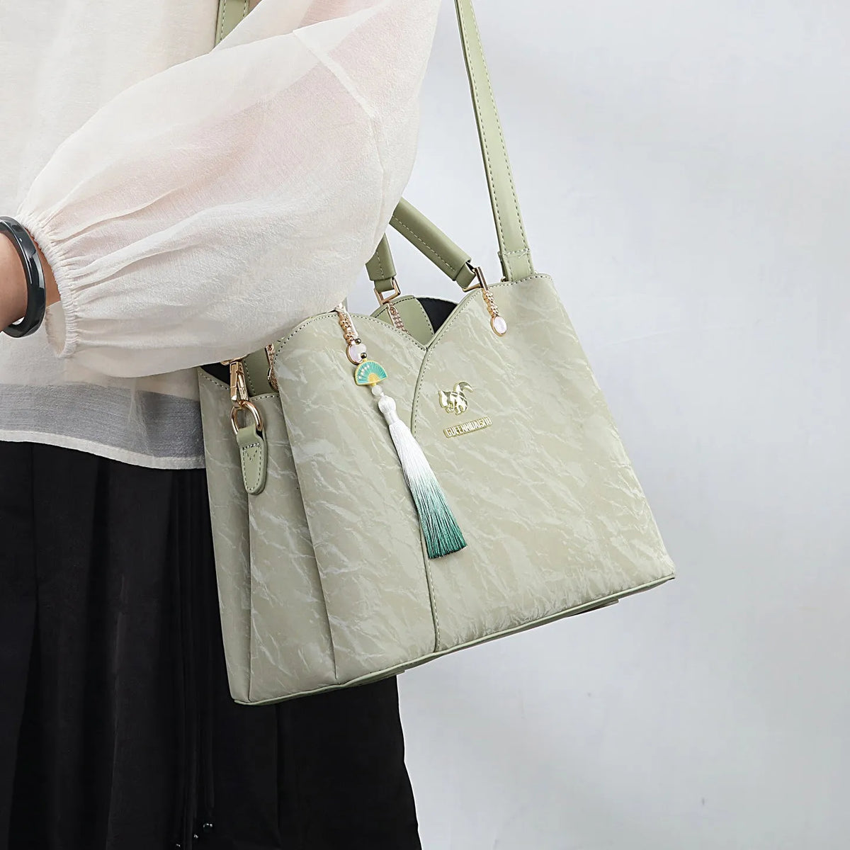 Women's soft PU messenger bag with sewing thread detail, horizontal square shoulder bag in beige, black, green, or red