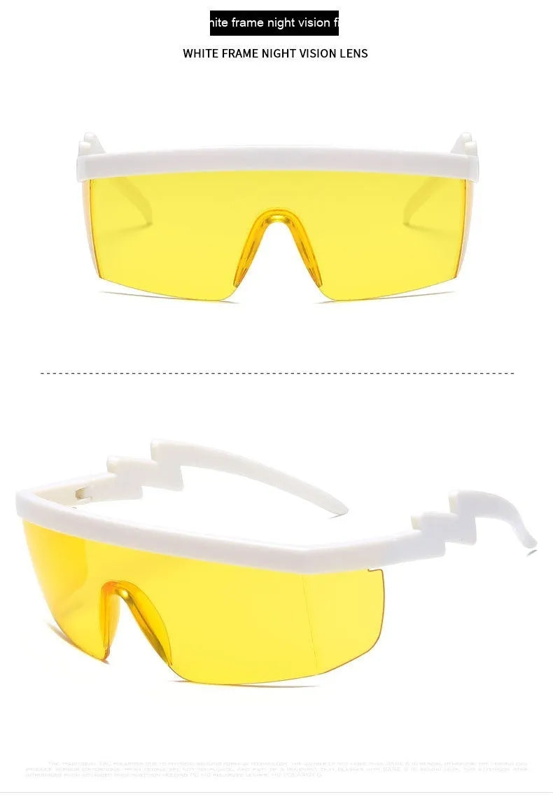 Black one-piece cycling sunglasses with blue polycarbonate lenses and lightning leg temples on a grey background.