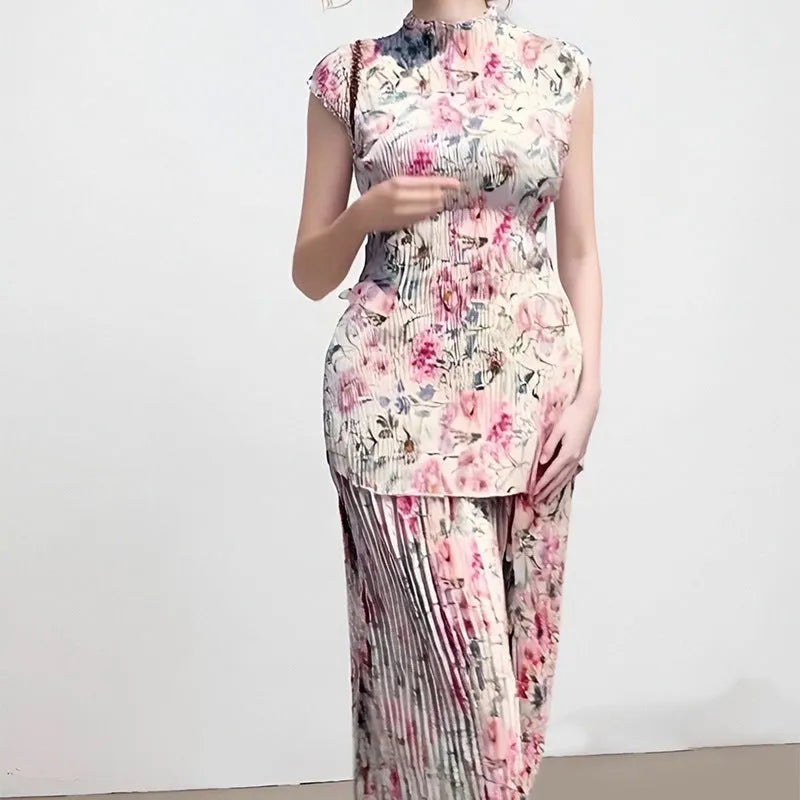Long sleeve printed chiffon dress with high waist, showing skirt and top as a two-piece set in picture colour.