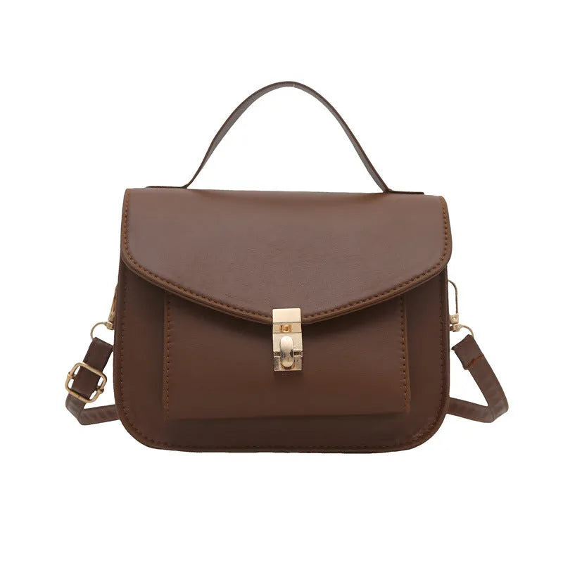 A horizontal square-shaped PU leather shoulder messenger bag in a choice of colours, showing the document compartment interior.