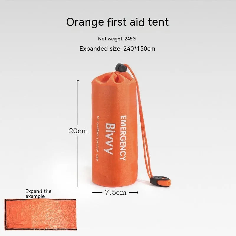 Orange emergency tent with sleeping bag and blanket disaster relief kit on ground