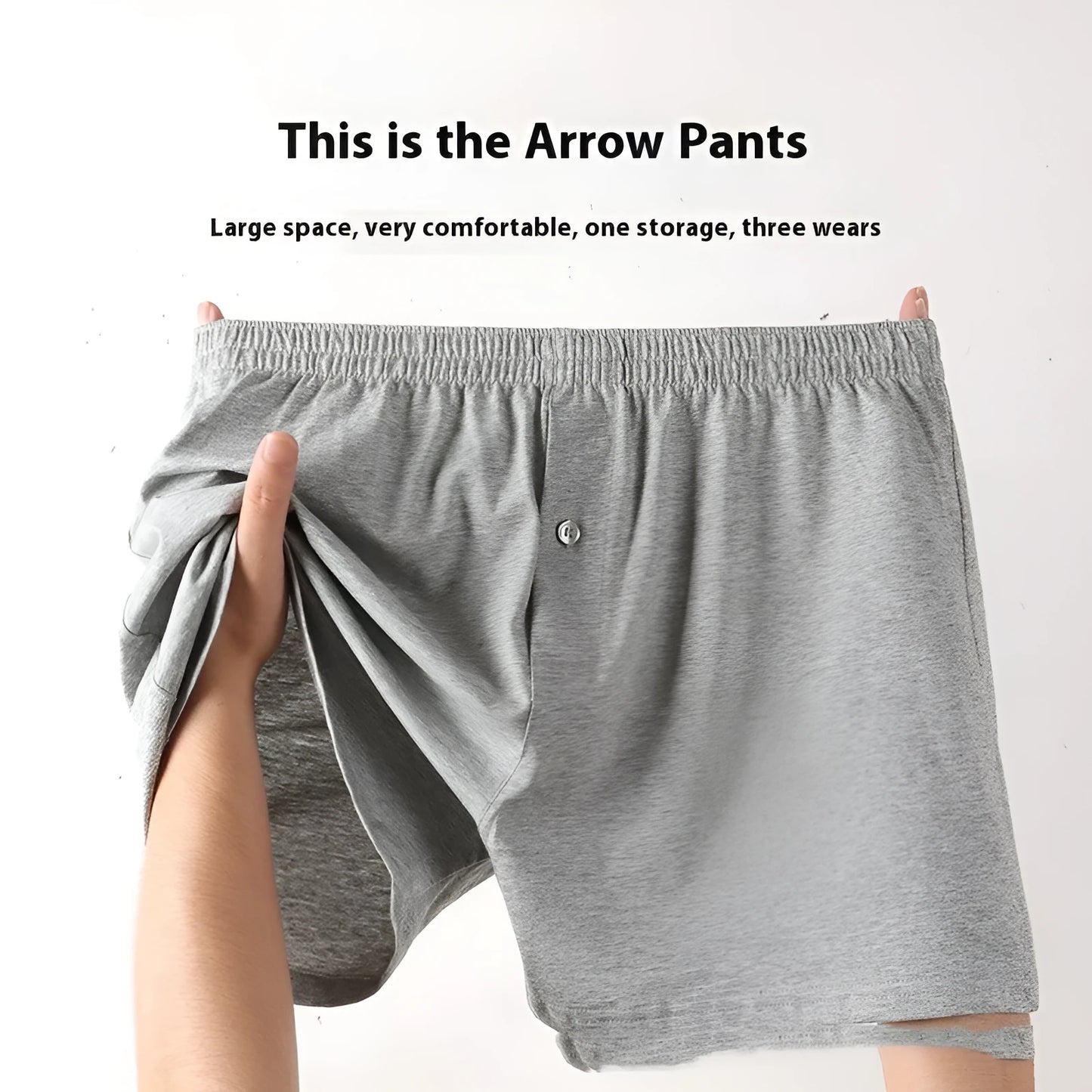 Men's light grey cotton boxer shorts with a loose fit and high waist on a plain background.