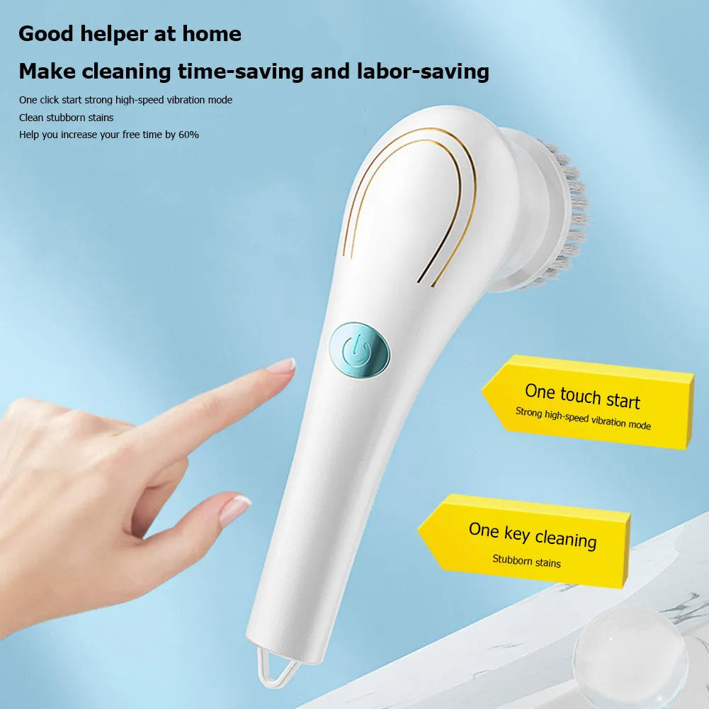 White cordless electric handheld scrubber with five attached brush heads on a kitchen counter