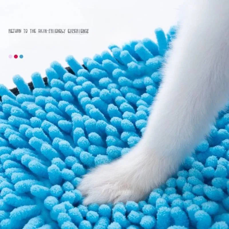 Blue dog bath robe towel laid flat, showing its 62cm by 23cm size and soft texture.