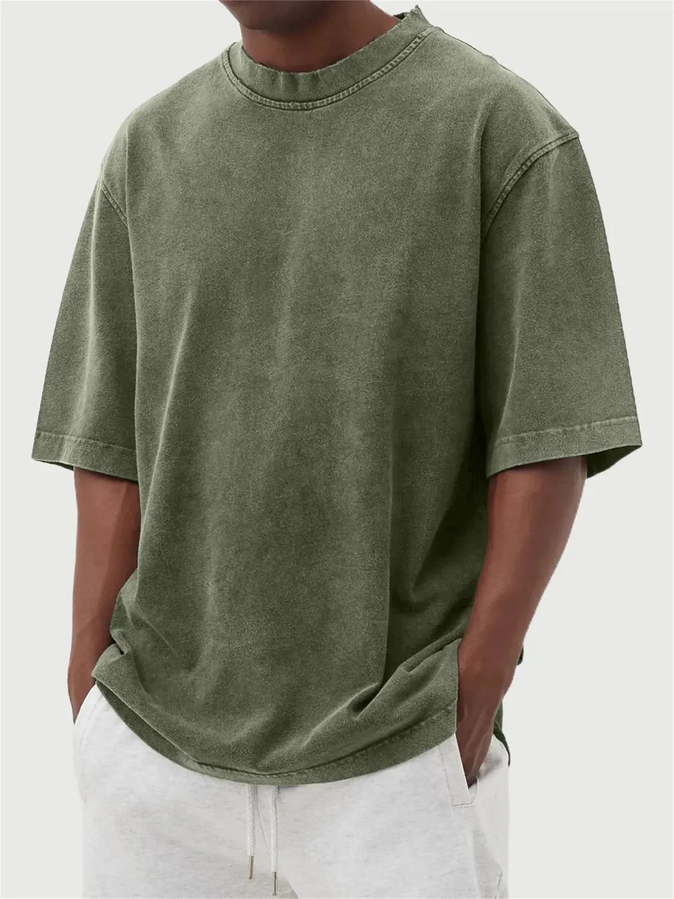 Men's loose fit stone-washed distressed short sleeve t-shirt in solid colour