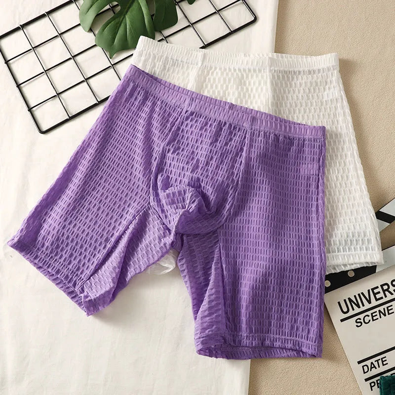 Men's solid-colour lace boxer shorts with a hip-lifting shaping design.