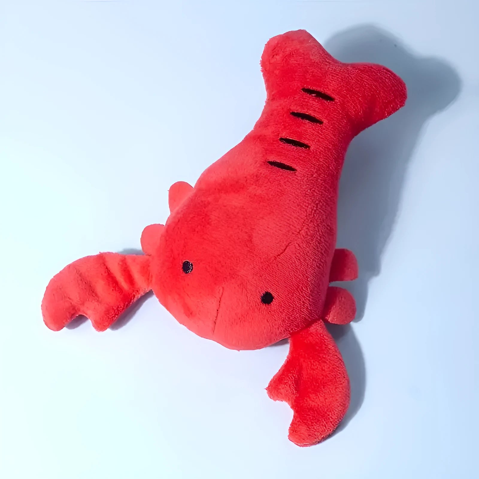 Red crab lobster shaped squeaky stuffed dog toy for small and medium breeds on a white background.