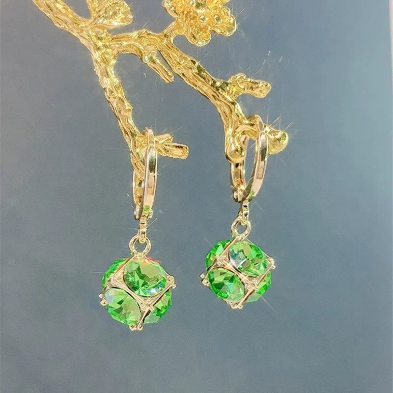 Geometric copper women's earrings with zircon accents and rose design elements in multiple colour variations