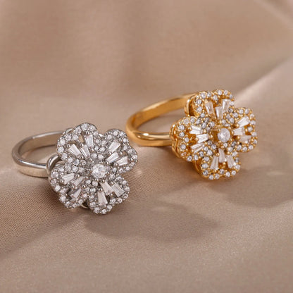 Rotatable copper flower ring with rhinestones, available in gold or platinum finish for women