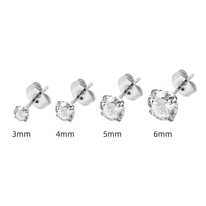 Simple geometric square and round zircon stud earrings in stainless steel with gold and steel colour finishes.