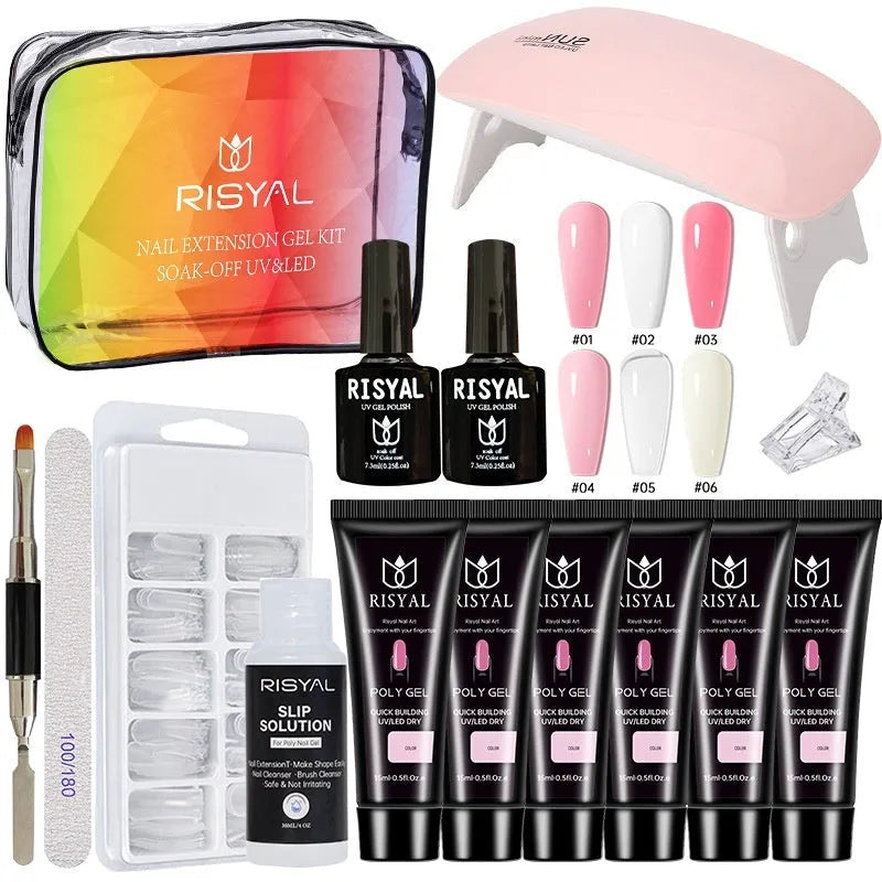 UV nail extension kit with polishes, mini lamp, glues, and metal tools in a zipper bag