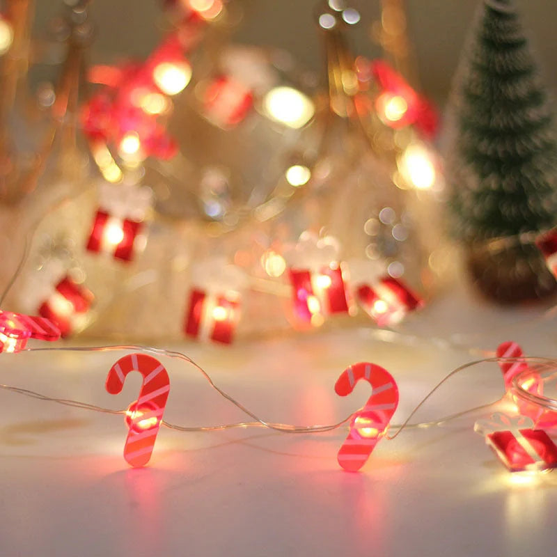 Copper wire LED Christmas decoration lights featuring festive designs like bells, trees, and elks
