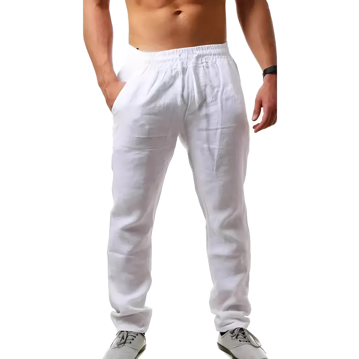 Man wearing loose-fitting cotton beach trousers in a solid colour, showcasing casual summer style.