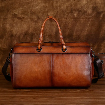 Handmade brown retro leather tote bag with large capacity for travel.