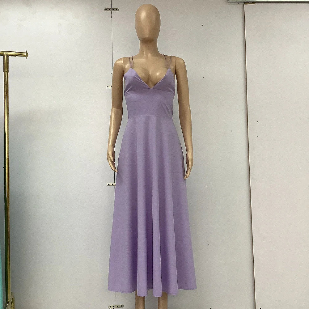 Elegant V-neck dress with adjustable straps, available in a range of vibrant colours for stylish summer wear