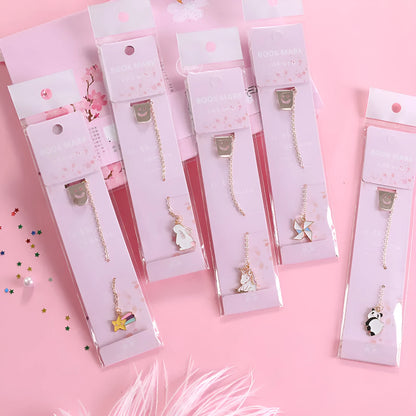 Alloy metal cartoon pendant bookmark with colourful charms including panda, rocket, and wishing bottle designs