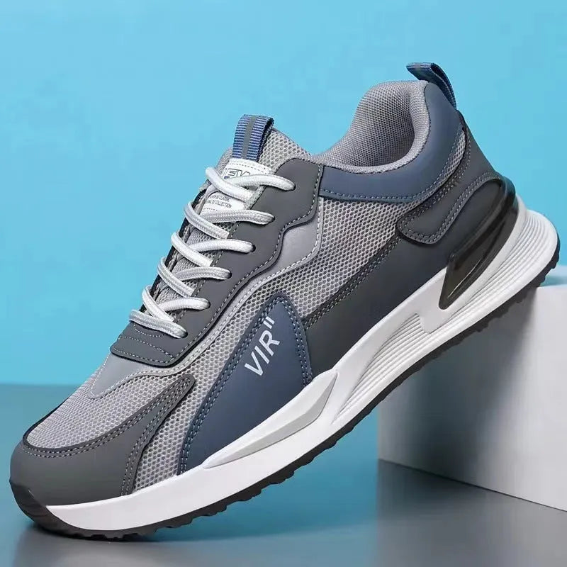 Men's colour block mesh sneakers in black, grey, and white with lace-up front and low-top design