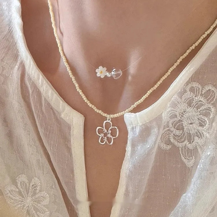 Women's necklace with hollow flower pendant and colourful beads, Korean-style U-shaped copper necklace with English letter elements, electroplated yellow beaded or blue beaded chain for female jewellery wearers