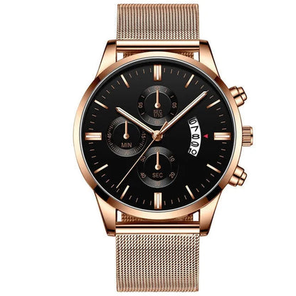 Men's stainless steel mesh band quartz watch with analog dial on a wrist.