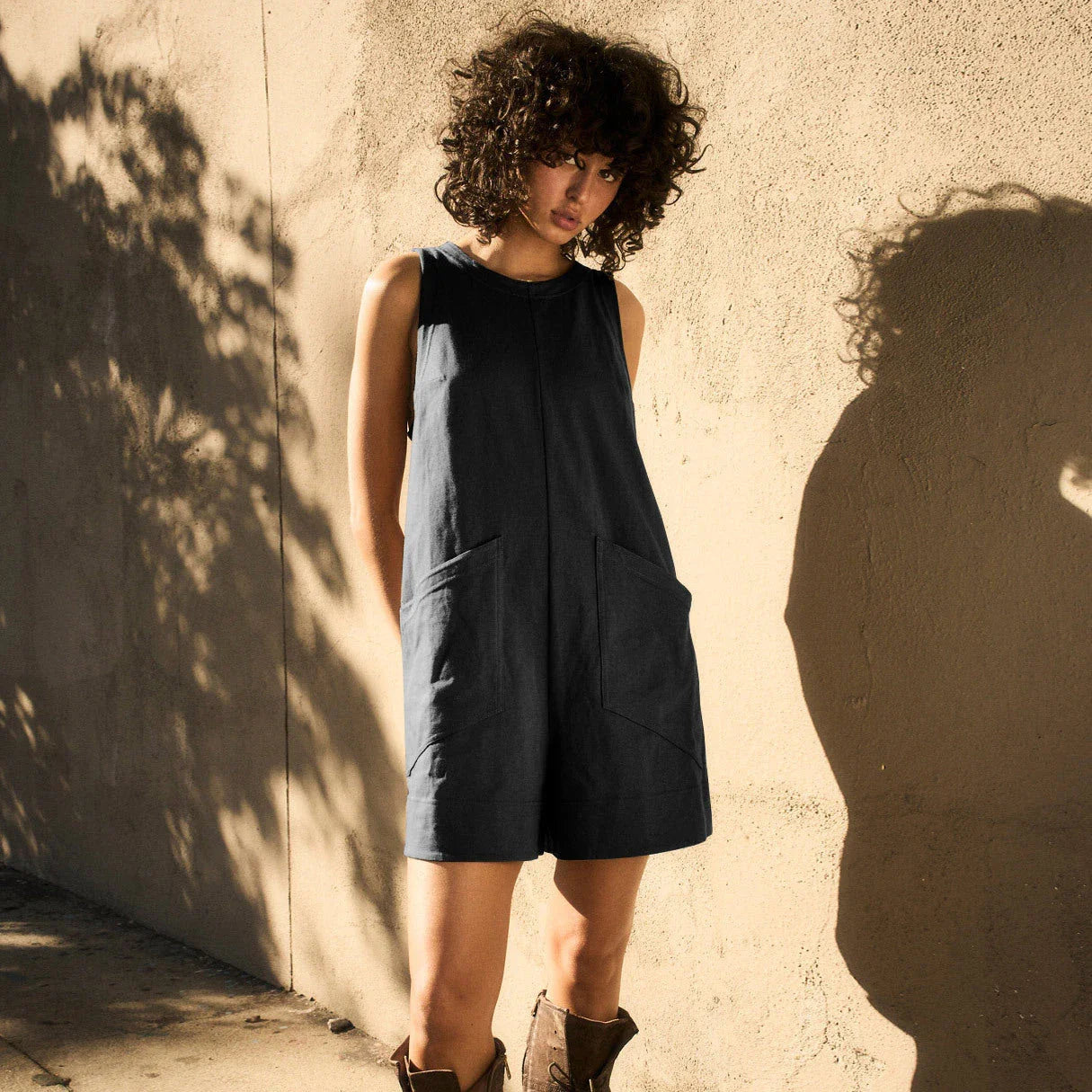 Stylish loose cargo jumpsuit with pockets in various colors, perfect for summer casual and beach wear