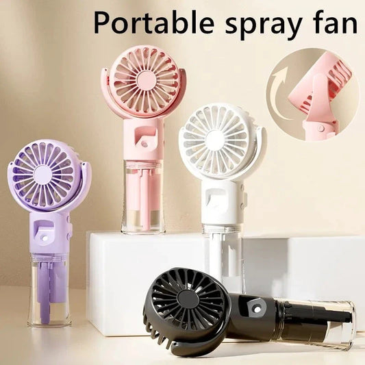 Compact handheld cooling mist fan with 4 adjustable wind speeds, perfect for staying cool and refreshed during the British summer