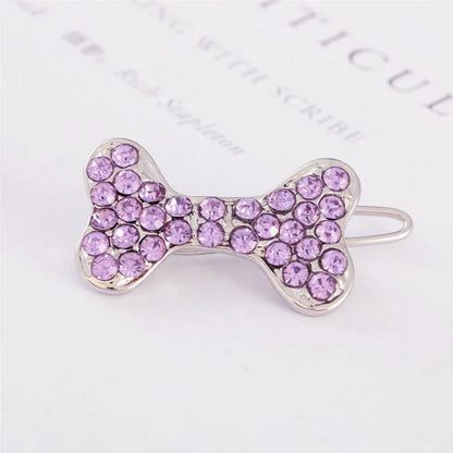 Rhinestone decorated dog bone shaped hair clip in alloy metal