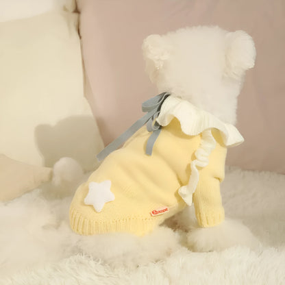 Yellow acrylic knit dog sweater on a small dog, showing casual style and fit.