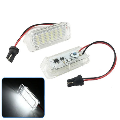 White 12V license plate lamp pair for Ford Focus Fiesta Mondeo with 6500K output and PC body