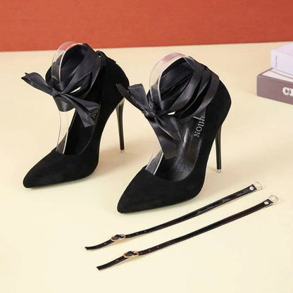 Women's black thin shallow mouth strap high heels with pointed toe on a white background