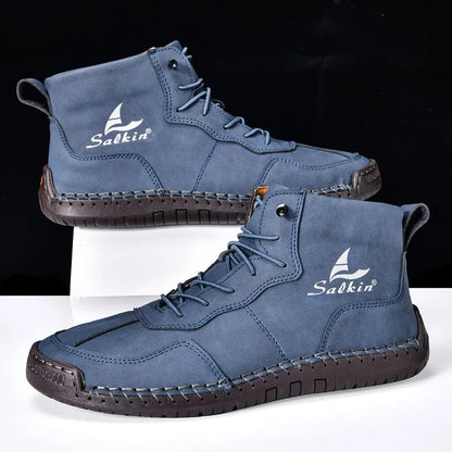 A pair of beige high-top casual boots with elastic band fastening and a flat rubber sole.
