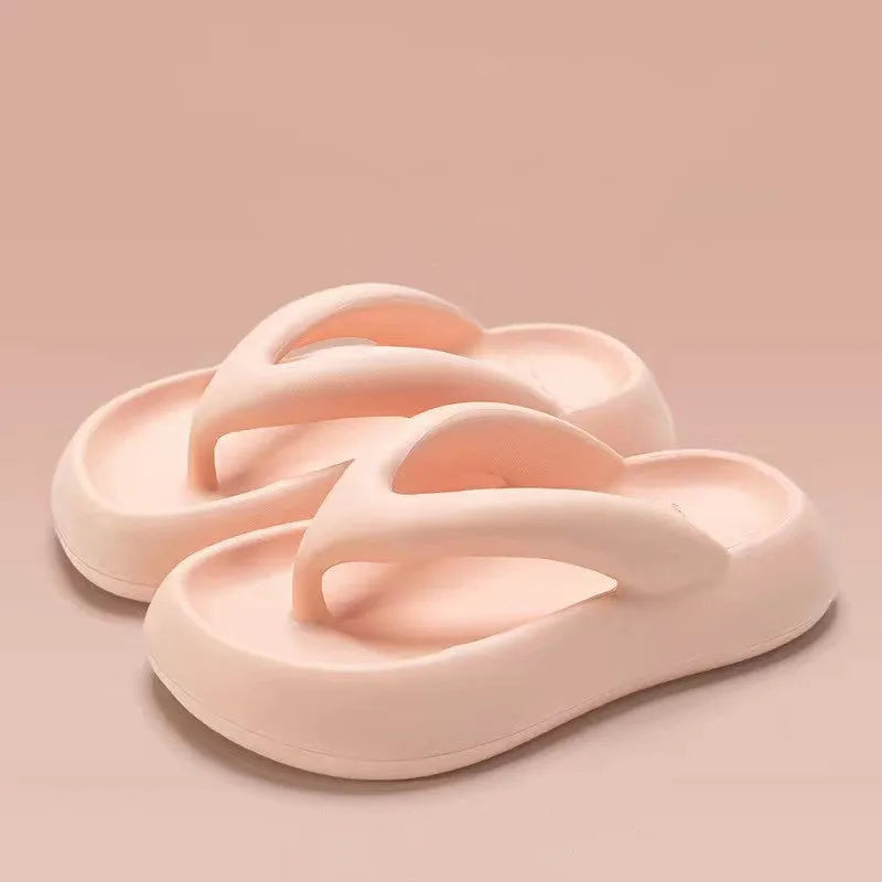 Solid colour thick-soled flip-flops with a bow on the strap, shown in multiple colour options.