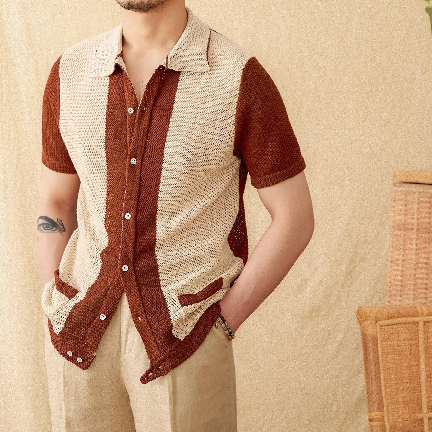 Beige cotton linen blend short-sleeved cardigan with lapel collar shown on hanger