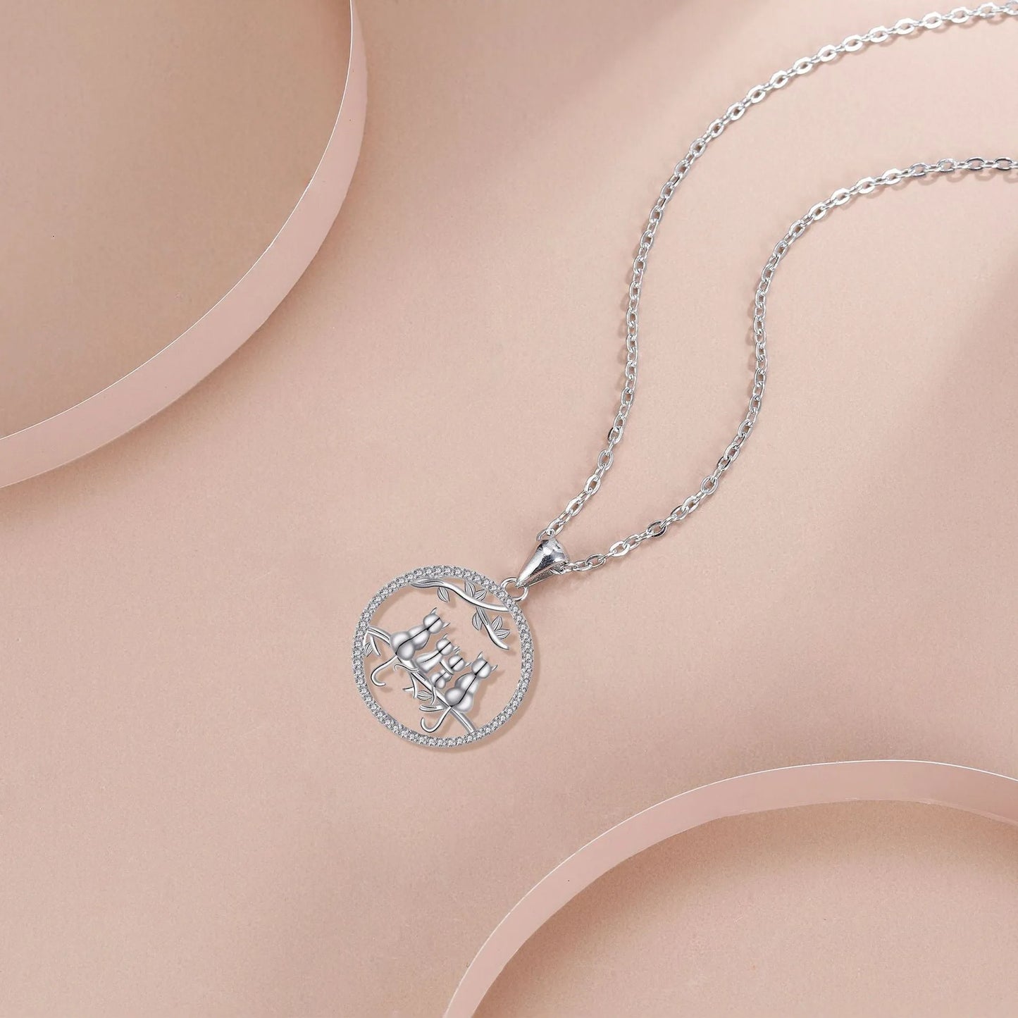 Four kitten necklace with copper pendant and cross chain, cat design jewellery