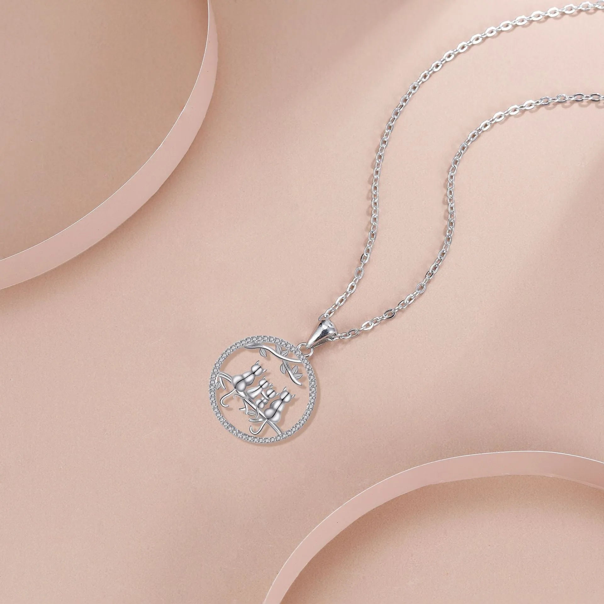 Four kitten necklace with copper pendant and cross chain, cat design jewellery