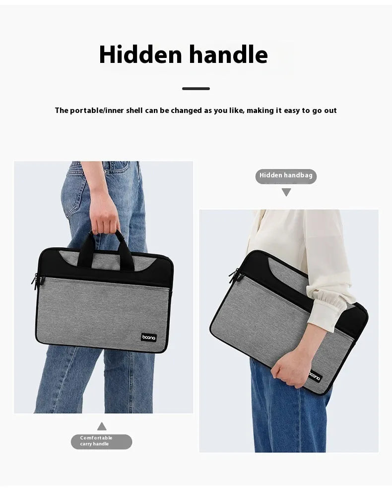 Black Oxford cloth laptop bag fully opened showing main compartment, with soft carry handle.