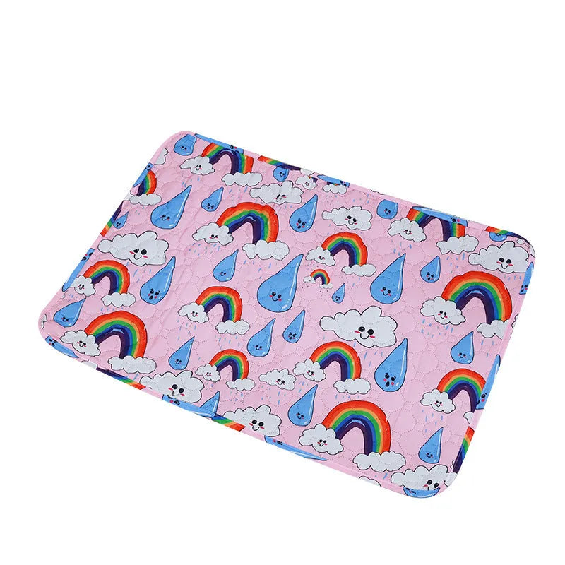 Reusable washable pet urine pad showing colourful animal pattern and waterproof backing.