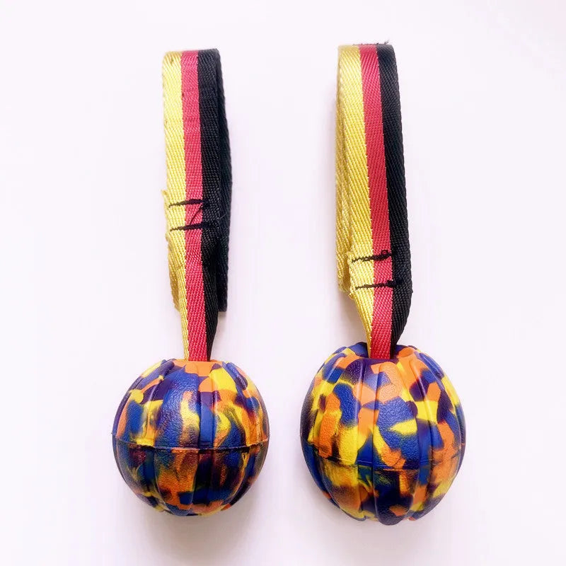 Dog training floating water bite-resistant pet supply string ball toy made from durable EVA material, designed for aqua fetch games, available in yellow or camouflage colours with choice of 6.5cm, 7cm or 9cm diameter size for different breeds.
