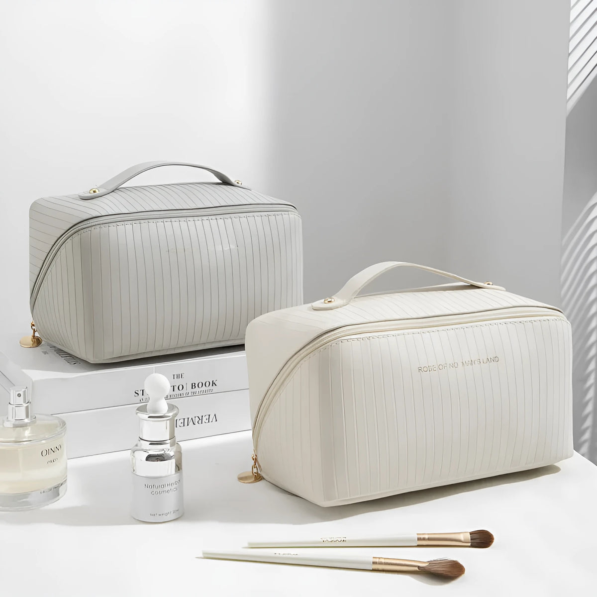Beige cubic makeup bag with vertical pattern measuring 22.5 by 12.5 by 12.5 centimetres