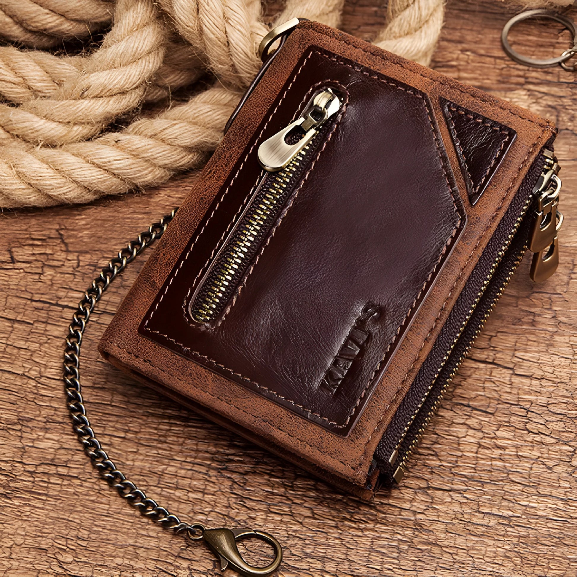 Men's dark brown leather wallet with chain detail showing RFID protection and first layer cowhide construction