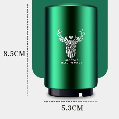 Stainless steel automatic bottle opener measuring 8.4 cm by 5.3 cm on a kitchen counter