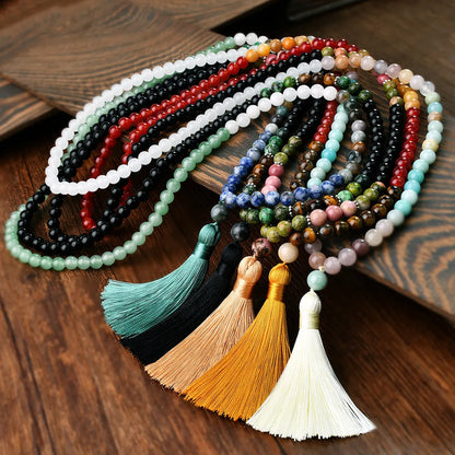 Handmade long necklace with geometric gemstone pendant and tassel on a ball bead chain