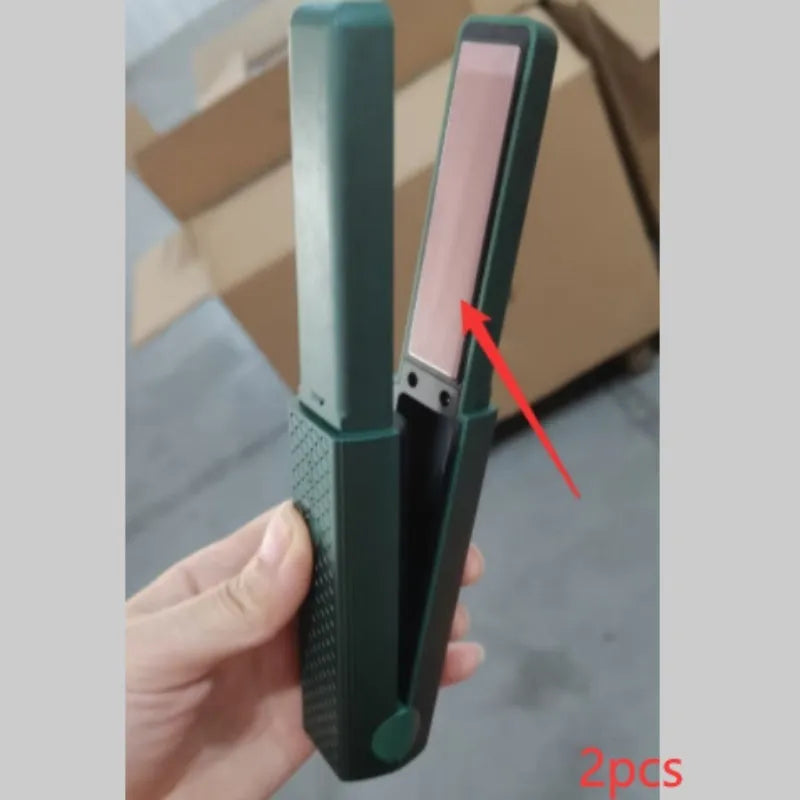 Pink and green cordless mini USB hair straightener and curler with ceramic plates.
