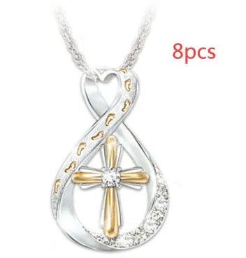 Elegant two-tone cross pendant with sparkling accent, featuring a captivating geometric design and adjustable chain