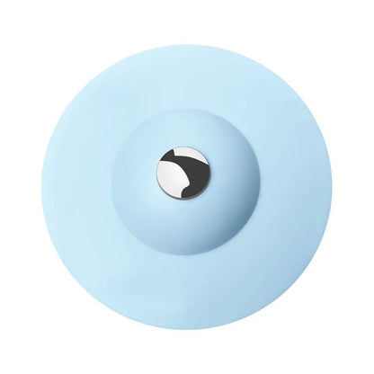 UFO-style silicone press sink drain cover in white, pink, gray, blue, and green