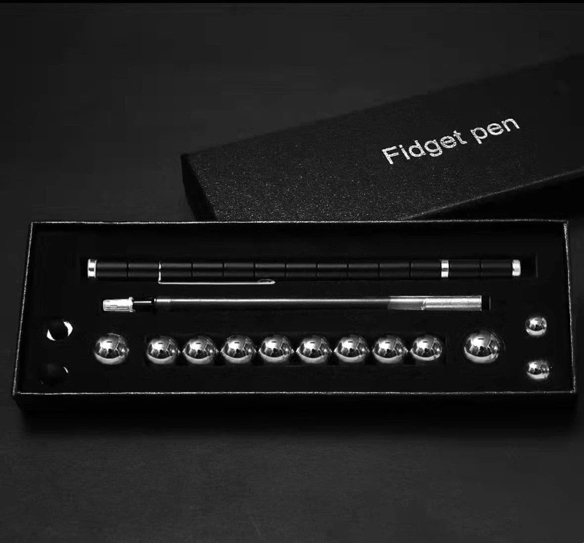 Modular magnetic pen with erasable ink, stress-relieving fidget features, and interchangeable components
