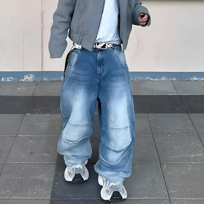 Men's blue washed denim jeans with baggy straight-leg cut and zip fly placket